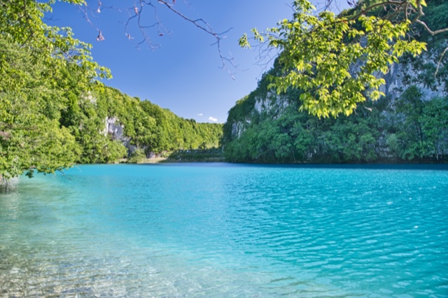 Plitvice Lakes Croatia turquoise cascading waterfalls with vivid colors